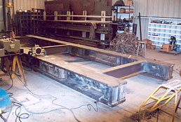 Large mild steel weldment undergoing metal stabilization